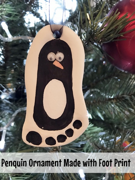 Penquin Ornament made with moldable clay and baby foot print